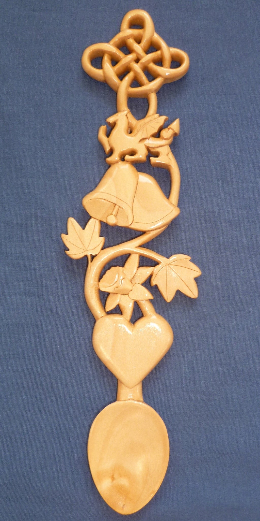 Wedding bells, dragon,daffodil and knot love spoon